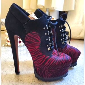 ALAIA ANKLE BOOTS